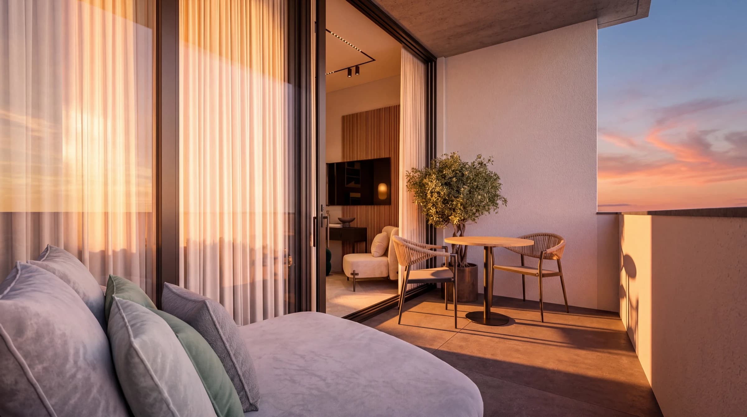 Sunset light on the private balcony of a sea-view suite at Poseidon Suites